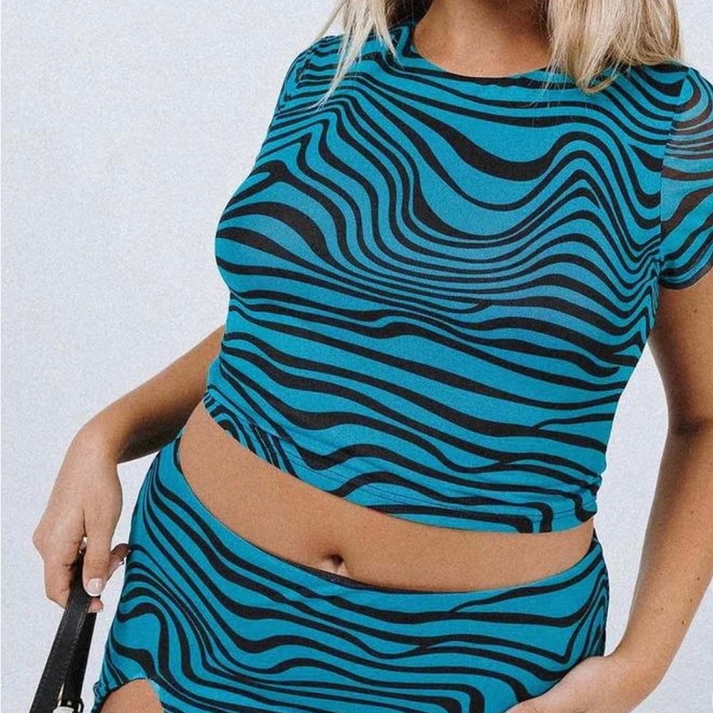Bold move set from Princess Polly in a teal zebra stripe color last pic is size